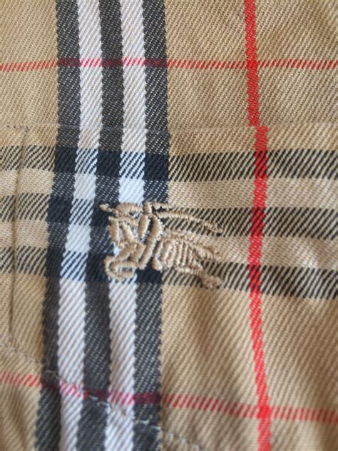 fake and real burberry shirts|authentic burberry polo shirt.